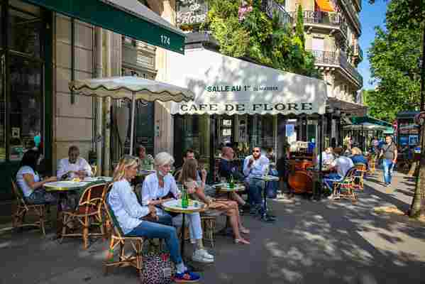 Street life returns to Paris as cafés and bistros take over the pavements